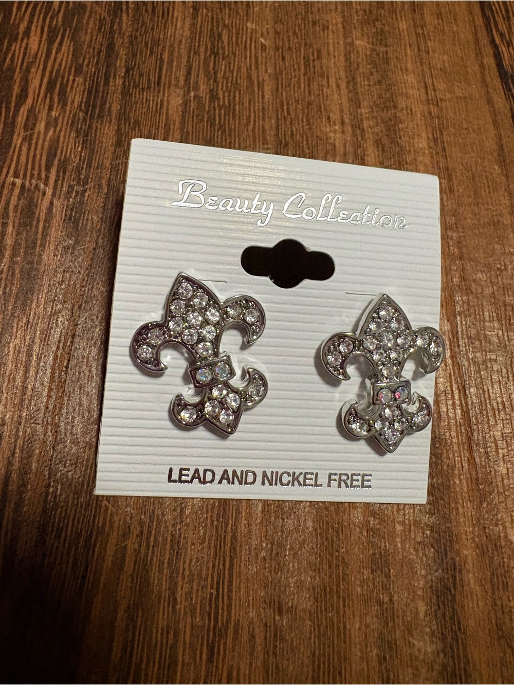 Flur de lis stud earrings